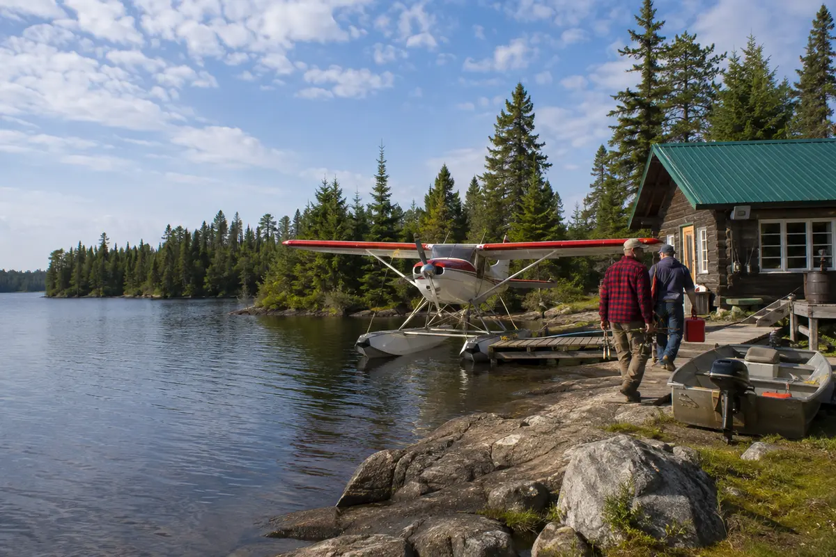A remote floatplane fishing camp on a granite Northern Ontario shoreline.